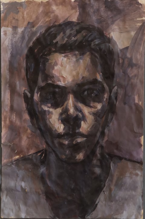 A dark, expressive portrait against a brown and gray background.