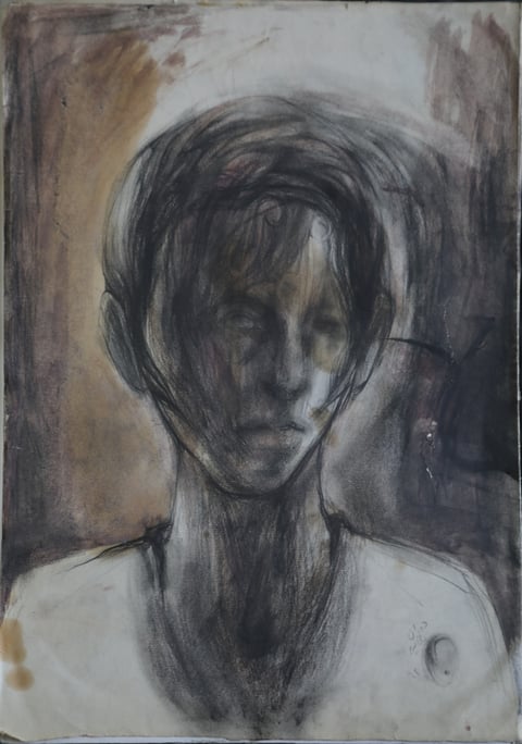 A loosely drawn portrait with dark hair and overlapping pencil lines.
