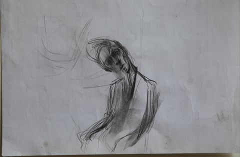 A pencil sketch of a seated figure with a bowed head.